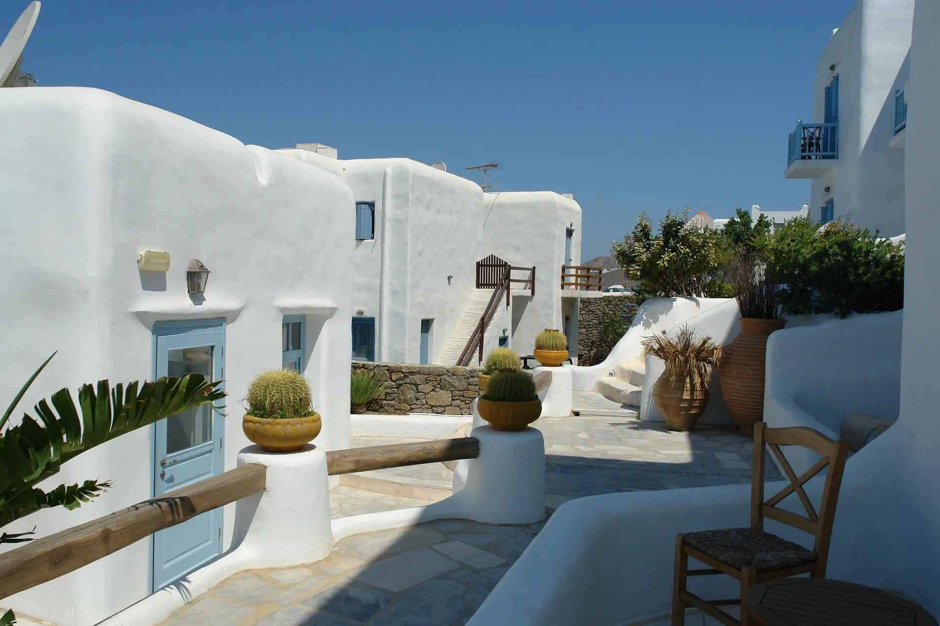 White buildings around a sunny courtyard
